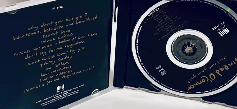 Compact disc and liner notes for Sinéad O'Connor's album "Am I Not Your Girl?"