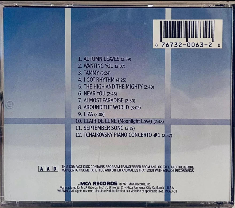 Back cover of a CD case listing song titles.
