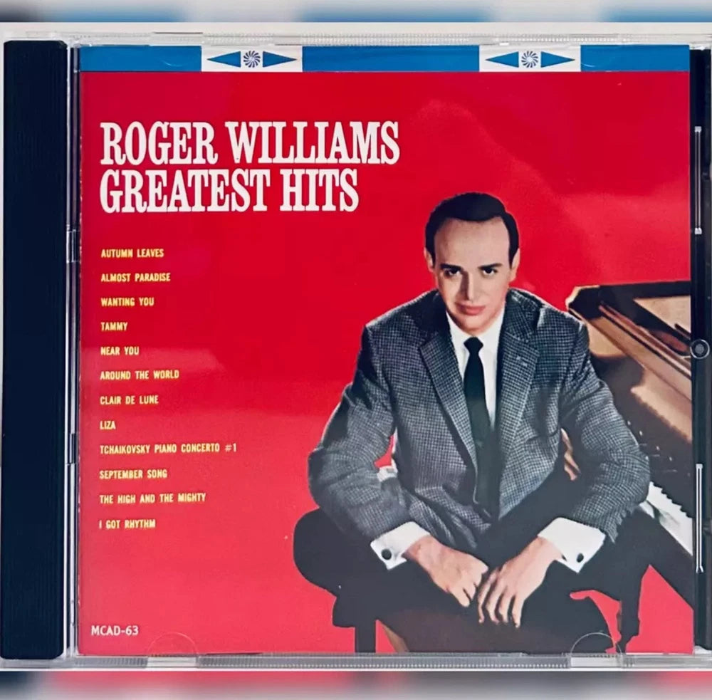 CD case featuring Roger Williams' "Greatest Hits" album cover. The cover is predominantly red and features Williams in a suit.